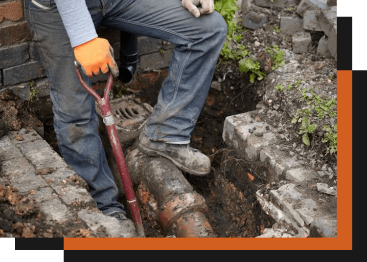 Man checking and working on pipe lines